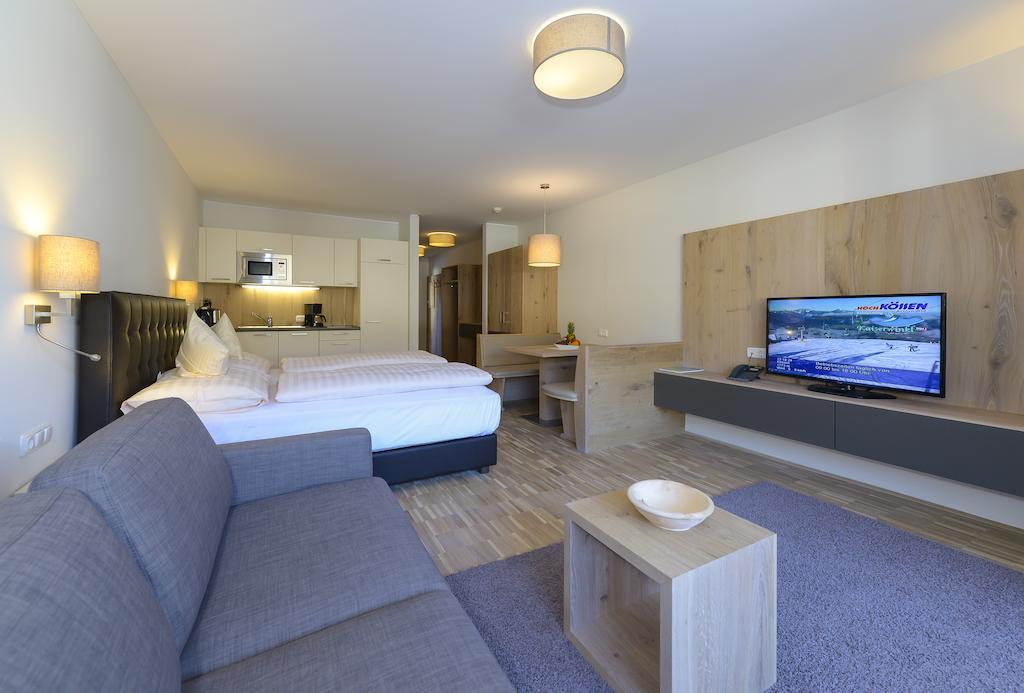 Appartementhotel Sonnenhof Kössen Rom bilde